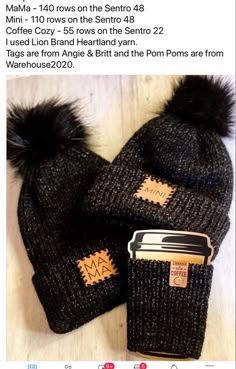 two knitted hats with black fur pom - poms on top of each other