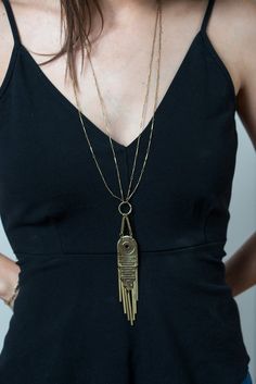 Ritz long Statement necklace with brass drop fringe Gold Fringed Long Necklace, Gold Fringe Long Necklace, Gold-tone Brass Long Chain Necklace, Gold-tone Long Brass Chain Necklace, Long Gold-tone Brass Chain Necklace, Gold Long Fringe Necklace, Gold Fringe Metal Necklace, Gold Fringe Metal Necklaces, Bohemian Gold Dangle Drop Necklace