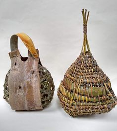 two vases made out of wood and wicker