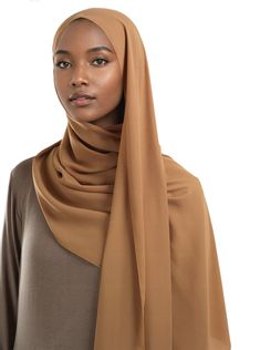 Discover the luxurious feel of our Korean Nida hijab. Made from a blend of nylon and polyester fibers, this mid-weight hijab boasts a smooth and soft fabric, perfect for everyday use. Experience a gorgeous drape and matte finish that will elevate your style to new heights. 70inch by 27in Modest Pants, Silk Maxi Dress, Milk Silk, Matching Dresses, Modest Dresses, Elevate Your Style, Modest Outfits, Dress Accessories, Soft Fabric