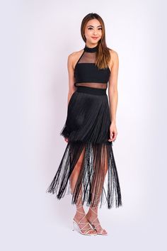 Black Bandage Halter Fringe Midi Dress Fitted Halter Neckline Bandage Top and Skirt Sheer Halter neck and waist Layered Fringe Skirt Overlay 90% Polyester 10% Spandex Perfect for Rodeo! Size & Fit Gina (Model is wearing Size S) Bust: 33" Waist: 26" Hips: 37" Height: 5’8" Fringe Midi Dress, Layered Fringe, Bandage Top, Cotton Box, Dress Fitted, Fringe Skirt, Top And Skirt, Box Pleats, Halter Neckline