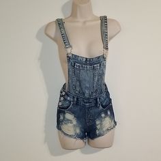 Thrill Blue Denim Damaged Distressed Jean Short Set In A Size 10, Measures Waistline Unstretched 26", 8.5" Rise, From Shoulder Strap To Bottom Hem Line Of Shorts 26" Not Fully Let Out In Shoulder Strap, 30" Hips Unstretched Never Worn. Bin#33 Fitted Distressed Jean Shorts For Spring, Fitted Distressed Jeans In Short Length, Fitted Ripped Denim Jean Shorts, Mid-rise Distressed Denim Jean Shorts, Distressed Mid-rise Denim Jean Shorts, Ripped Dark Wash Denim Jean Shorts, Ripped Dark Wash Denim Shorts, Casual Distressed Fitted Jean Shorts, Ripped Medium Wash Denim Jean Shorts