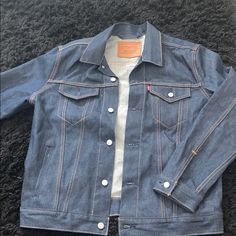 Brand New Levi Jacket Dark Denim In A Size Large Levi Jacket, Levis Jacket, Jean Jackets, Dark Denim, Jean Coat, Jean Jacket, Levi's, Color Blue, Jackets & Coats