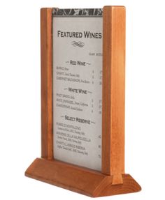 a wooden plaque holder holding a wine list