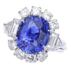 A 7.02 carat Natural Sapphire Ceylan non heated mounted on a Diamond and Platinum Ring. French marks. Circa 1940. Ceylon Sapphire Ring, Elegant Dressing, 1940s Art Deco, 1940s Art, Sapphire Cocktail Ring, Triangle Diamond, Yellow Sapphire Rings, Platinum Diamond Rings, White Gold Sapphire