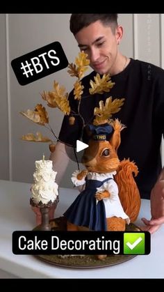 a man standing next to a cake decorated like a squirrel