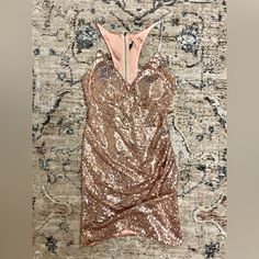 Small Rose Gold Sequin Party Dress! Never Worn! Pink Mini Dress For Prom Season Night Out, Pink Sequin Dress For Holiday Party, Pink Sequin Dress For Night Out And Holiday, Pink Sequin Dress For Holiday Night Out, Chic Pink Holiday Sequin Dress, Pink Mini Dress For Date Night And Prom Season, Pink Dressy Mini Dress For Prom Season, Pink Dressy Mini Dress For Prom, Dressy Pink Mini Dress For Prom