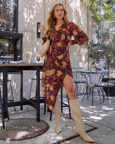 Embrace the season with the Harvest Love Floral Print Wrap Midi Dress. Made from lightweight crepe fabric, this dress flows beautifully with an asymmetric hem that dances with every step. The rich floral print and warm hues celebrate the essence of fall, with an unforgettable wait tie accent that cinches the waist making this look all the more crafted to you. Pair it with your favorite boots for a look that's effortlessly chic and perfectly attuned to fall vibes. Lightweight crepe fabric with as Fall Dress, Favorite Boots, Wrap Midi Dress, Long Sleeve Print Dress, The Harvest, Crepe Fabric, Fall Dresses, Fall Vibes, Asymmetric Hem