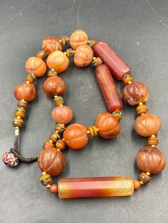 Very unique old antique carved Tibetan carnelian bead necklace Vintage Amber Jewelry With Large Beads, Unique Orange Necklace With Polished Beads, Unique Orange Necklace With Large Beads, Carved Carnelian Vintage Jewelry, Antique Carved Carnelian Jewelry, Vintage Carved Carnelian Jewelry, Unique Carnelian Necklaces With Large Beads, Carnelian Necklaces With Large Beads, Unique Orange Round Bead Necklaces