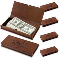 four wooden boxes with money in them and the words merry christmas written on each box