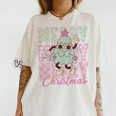 Holiday White Printed Top, White Custom Print Christmas Tops, Holiday White T-shirt With Graphic Print, White Christmas Tops With Custom Print, White Graphic Print T-shirt For The Holiday, White Graphic Print T-shirt For Holidays, White Christmas Cartoon Print Tops, White Christmas Tops With Cartoon Print, Funny White T-shirt For Holiday