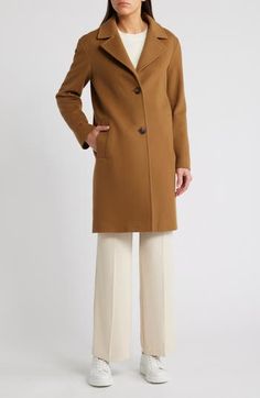 Crafted from luxe Italian wool, this staple coat features a pickstitched outline for extra style points. 39" length (size 8) Front button closure Notched lapels Front welt pockets Back vent Lined 100% wool Dry clean Made in the USA Structured Wool Outerwear, Beige Fitted Wool Coat With Concealed Placket, Fitted Beige Wool Coat With Concealed Placket, Elegant Brown Wool Coat For Spring, Luxury Structured Wool Coat For Fall, Classic Structured Boning Outerwear For Work, Elegant Wool Coat With Welt Pockets, Elegant Brown Pea Coat With Notch Lapel, Chic Brown Wool Coat With Notch Lapel