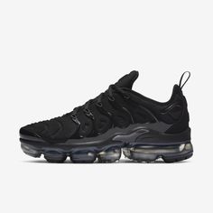 BLACKED-OUT AIR. The Nike Air VaporMax Plus looks to the past and propels you into the future. Made with at least 20% recycled material by weight, it keeps the future in mind while including design elements from the '98 Air Max Plus. Revolutionary VaporMax Air technology provides comfort and a modern look, while the floating cage, heel logo and iconic whale tail midfoot shank add heritage style. A sleek all-black upper and black rubber pods on the outsole show off your dark side. Benefits Origin Nike Air Vapormax Plus Women, Black Vapormax, Vapormax Plus Black, Nike Vapormax Plus, Vapormax Nike, Nike Noir, Nike Vapor Max, Zapatillas Nike Air, Vapour Max Nike