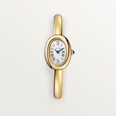 Cartier - Baignoire watch - Watch  - Baignoire de Cartier watch, mini model, size 15, quartz movement. 18K yellow gold (750/1000) case. 18K yellow gold (750/1000) beaded crown set with a sapphire cabochon. 18K yellow gold (750/1000) rigid bracelet. Silvered dial, blued-steel sword-shaped hands, sapphire crystal. Length: 24.6 mm, width: 18.7 mm, thickness: 7.2 mm. Water-resistant up to 3 bar (approx. 30 meters). Cartier Yellow Gold Watch With Diamond Hour Markers, Cartier Gold Watch With Rectangular Dial, Gold Cartier Watch With Rectangular Dial, Luxury Gold Cartier Watch, Cartier Yellow Gold Evening Watch, Evening Cartier Yellow Gold Watch, Yellow Gold Watch With Round Dial For Evening, Luxury 14k Gold Watch For Formal Occasions, Evening Yellow Gold Cartier Watch