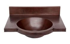 a wooden bowl sitting on top of a white table next to a brown countertop