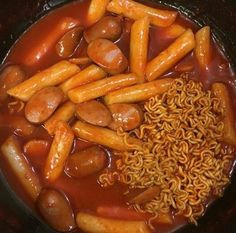 the meal is prepared and ready to be eaten in the pot on the stove top