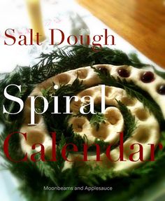 the cover of a spiral calendar with fruit and veggies on it, sitting on a table