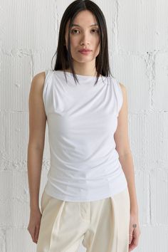 Information The Adriana Top is an elegant draped shoulder top. It features a classic boat neckline for a flattering, modern look. Crafted from a rayon-spandex blend, this top is both stretchy and soft. Style this top with a pair of trousers for a chic look that'll take you from day to night. Details 95% Rayon, 5% Spandex Draped Shoulder Detail Stretch and Soft Knit Boat Neck Kat is 5'10" and wearing a size SMeasurements: 32" Bust, 24" Waist, 35" HipStyle #TR3656 Classic Boat, Elegant Drapes, Classic Boats, Chic Look, Boat Neckline, Day To Night, To Night, Soft Style, Body Skin Care