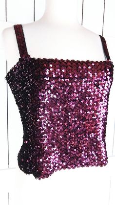 "Vintage sequins stretch tank top/sequin stretchy fitted cropped tube top/medium Measurements... -marked size: medium (fits larger) -across width: 17.5\" unstretched -length: 12\" -strap length: 6.5\" Features... -sequins throughout -great stretch -pullover style -soft black lining -Union made Condition... -excellent vintage condition -gently worn TDD3176*" Fitted Tank Crop Top For Evening, Fitted Disco Crop Top For Evening, Glamorous Fitted Crop Top Tank Top, Fitted Sleeveless Sequin Fabric For Night Out, Strapless Fitted Crop Top For Party Season, Fitted Strapless Crop Top For Party Season, Fitted Disco Sequin Fabric For Summer, Evening Sequin Stretch Crop Top, Evening Sequined Stretch Crop Top