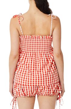 Whimsical ruffles trace the neckline of this sweet camisole that will have you ready for your next picnic date. Square neck Adjustable tie straps 70% polyester, 30% cotton Machine wash, tumble dry Imported Summer Smocked Top With Ruffled Straps, Summer Vacation Smocked Top With Square Neck, Casual Gingham Smocked Top With Ruffles, Spring Plaid Smocked Top With Ruffles, Summer Smocked Top With Ruffled Straps For Brunch, Summer Smocked Top For Picnic With Smocked Back, Summer Smocked Top With Smocked Back For Picnic, Summer Smocked Top With Adjustable Spaghetti Straps, Summer Smocked Top With Spaghetti And Adjustable Straps