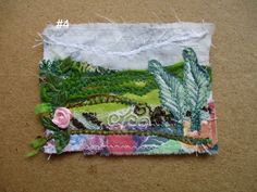 a piece of fabric with flowers and plants on it