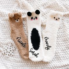 Cute Panda Bear Socks are a fun personalized gift idea for women, friends, & family this holiday season. Get them for your best friends to match at a sleepover or for Christmas morning with the family. Pair them with our comfy sleep shirts, robes, or PJs for a complete gift idea. These fuzzy crew-length socks have adorable bear faces, and are personalized with custom names in black vinyl. Choose from a brown bear, white bear, and a black & white panda bear. DETAILS Listing is for 1 Pair of Fuzzy Bear Socks with Custom Name. NO RETURNS OR EXCHANGES ON SOCKS/CLOTHING ITEMS. Style: Fuzzy Bear Crew Socks (text is printed in black vinyl) Size: Fits shoe sizes 5-9. NO RETURNS OR EXCHANGES ON SOCKS/CLOTHING ITEMS. CARE INSTRUCTIONS:  Wash inside out, gentle cycle, cold water, tumble dry low. More Funny Letter Print Socks As Gift, Funny Letter Print Socks Gift, Cute Super Soft Socks For Gift, Customizable White Socks As Gift, Customizable White Socks For Gift, Customizable White Socks For Gifts, Cozy Super Soft Socks For Gifts, Cozy Super Soft Socks As Gift, Super Soft Playful Socks For Gift