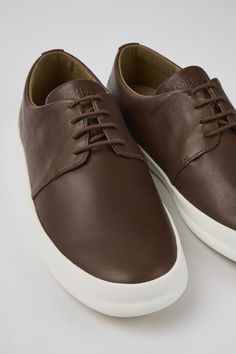 Modern Low-top Lace-up Shoes With Leather Sole, Leather Slip-on Sneakers With Vulcanized Sole And Round Toe, Brown Leather Walking Shoes With Contrast Sole, Modern Leather Walking Shoes For Streetwear, Urban Leather Slip-on Sneakers With Round Toe, Modern Leather Walking Shoes With Round Toe, Functional Everyday Sneakers With Round Toe, Modern Lace-up Shoes With Round Toe And White Sole, Modern Low-top Slip-on Sneakers With Removable Insole