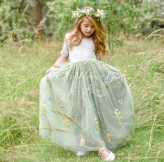 Beautiful Embroidered style boho Flower Girl and Occasion Dress A beautiful quality embroidered dress, layers of quality tulle that is nipped along the waist to ensure the skirt is a fuller looking dress.  The off white lace has a pretty pattern and perfect to blend with both white and ivory wedding colours. These are good sizing for ages stated.  Please note that the sizes are stated for average ages of UK Western Children and should fit for average American Children.    Available in ages 6 mon Bohemian Flower Girl Dress, Bohemian Flower Girl, Dress Layers, Boho Flower Girl, Pagan Wedding, Green Tulle, Junior Bridesmaid Dress, American Children, Junior Bridesmaid Dresses