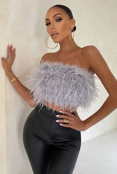 Flock towards a style win with the soft BARBARA Feather Crop Top. Made with floating real ostrich feathers, this exquisite piece pairs perfectly with tailored trousers, leather pants, and your fave mini or midi skirt to create a show-stopping look. Fabric | Real Ostrich Feathers Lining | Silk Polyester Feather Crop Top, Strapless Tank Top, Trendy Summer Fits, Skirt Shapewear, Party Crop Tops, Feather Tops, European Design, Loose Outfit, Top Cropped