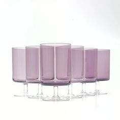 Mauve purple wine or water glasses, set of 6.    This is a stunning set of transparent lavender-purple and clear cylindrical stemmed wine or water glasses. Hand-made in Poland. These pieces are hand -made, so slight variations in terms of color and shape are expected. Height: 5.5"H   Width: 3.25"W Purple Wine, Mauve Purple, Water Glasses, Lavender Purple, Fort Lauderdale, Wine Glasses, Poland, Barware, Hand Made