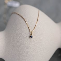 Blue Sapphire pendant in 14K solid yellow gold in prong set. A minimal necklace for women, ideal for a birthday gift, as sapphire is the September birthstone. It is sold as necklace or just pendant without chain. D E T A I L S ● Metal: 14K solid gold, 14K white gold ● Gemstones: Sapphire, round cut 3mm ● Gemstones Weight: Sapphire 0.10 ct ● Length: 40 cm - 16 inches H O W ∙ T O ∙ O R D E R Choose from the drop-down menu the available options (Metal) and leave us a note for any special requirements. G I F T S All our pieces are delivered beautifully packaged and gift ready with a certificate of authenticity for the metal and the stones. P R O D U C T I O N ∙ T I M E * S H I P P I N G * P O L I C I E S Please keep in mind that each item is handcrafted, and we need 5 days at least for its pro Luxury Dainty Sapphire Jewelry, Dainty Sapphire Necklace, Minimalist Yellow Gold Birthstone Necklace With Delicate Chain, Sapphire Fine Jewelry Birthstone Necklace, Elegant 14k Gold Birthstone Necklace With Prong Setting, Elegant Yellow Gold Birthstone Necklace With Prong Setting, Delicate Sapphire Jewelry For Gifts, Everyday Gold Sapphire Jewelry, Minimalist Formal Birthstone Necklace With Delicate Chain