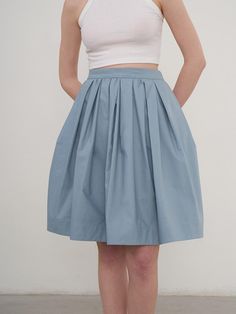 It's easy to wear, comfortable and looks good with just about everything.You will be more stylish in this skirt.No wardrobe is complete without this midi skirt. - Knee length pleated skirt - Fits perfectly everywhere- It's lightweight and comfy with nylon and cotton blend- Whether you add a tee or a blazer, you'll have plenty of pairing options with this chic style- Lightly lined and perfect for layering through the seasons Summer Flared Mini Skirt With Accordion Pleats, Pleated Voluminous Skirt For Summer, Spring Accordion Pleated Flowy Mini Skirt, Summer Accordion Pleated Mini Skirt, Accordion Pleated Flared Mini Skirt, Casual Voluminous Pleated Flared Skirt, Chic Blue Skirt With Accordion Pleats, Voluminous Pleated Skirt For Summer, Blue Relaxed Skirt With Pleated Hem