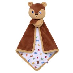 a brown teddy bear with a blanket on it's back, sitting in front of a white background