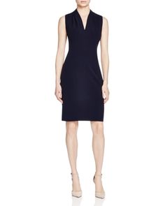 A timeless office-to-out staple, T Tahari's curve-contouring dress is a smart style investment, and the sleeveless silhouette means you can easily layer without added bulk. Elegant Sleeveless Career Dress, Tailored Sleeveless Business Dress, Sleek Knee-length Sleeveless Dress For Work, Flattering Knee-length Sleeveless Dress For Work, Sheath Sleeveless Dress For Work, Sleek Sheath Sleeveless Dress For Workwear, Rajputi Dress, Pleat Dress, Wear To Work Dress