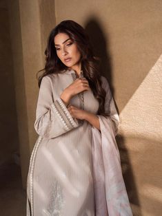 Brand: SaharProduct Code: S24-TL-L1-05Collection: Mirage by Sahar Unstitched Spring Summer CollectionFabric: Lawn DESIGN DETAILS: Embroidered Front Panel on Fancy Slub Lawn Fancy Slub Lawn Back Panel Embroidered Sleeves Digital Printed Silk Dupatta 2.5M Dyed Cambric Trouser 2 M DISCLAIMER:* Lining, Laces, and Tassels are not included in unstitched variants.* Embellishment items in stitched outfits are subject to market availability.* Product color may vary due to photographic lighting or your device settings. CARE INSTRUCTIONS: Extra Fabric Has Been Used For Shoot Original Color May Vary Slightly From The Picture Dry Clean Recommended Iron The Clothes At Moderate Temperature Do Not Use Bleach, Or Stain Removing Chemicals Damp Fabric Should Not Be Exposed To Sunlight Mirage by Sahar Unstitc Luxury Beige Summer Suit, Luxury Slub Silk Sets For Spring, Luxury Embroidered Slub Silk Dress, Luxury Elegant Tussar Silk Lawn Suit, Luxury Beige Lawn Suit With Dupatta, Luxury Cambric Dupatta For Spring, Luxury Designer Lawn Suit With Self Design, Luxury Women's Lawn Suit, Luxury Printed Summer Lawn Suit