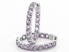 6.80ctw round lavender amethyst rhodium over sterling silver inside/outside hoop earrings. Measure approximately 1 5/16"L x 1/8"W. Hinged backings. Gemstone Hoop Earrings Fine Jewelry, Formal Round Gemstone Hoop Earrings, Formal Silver Gemstone Hoop Earrings, Luxury Round Gemstone Hoop Earrings, Luxury Round Hoop Earrings With Gemstones, Silver Gemstone Hoop Earrings Fine Jewelry, Fine Jewelry White Gold Hoop Earrings With Gemstone, Silver Hoop Earrings With Gemstones In Fine Jewelry Style, Elegant Round Faceted Hoop Earrings