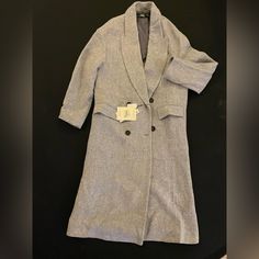 Beautiful Basic Double-Breasted Coat. Slightly Oversize. Marl Medium Gray. Italian Manteco Wool Blend- 42% Wool, 32% Lyocell, 24% Polymide, 2% Other. Partial Lining 100% Viscose. Two Large Front Flap Pockets. Elegant Double-breasted Linen Outerwear, Elegant Oversized Gray Outerwear, Elegant Winter Linen Blazer, Elegant Linen Blazer For Winter, Elegant Oversized Outerwear For Business, Elegant Oversized Business Outerwear, Elegant Business Oversized Outerwear, Tailored Linen Winter Outerwear, Tailored Linen Outerwear For Winter