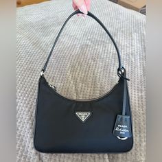 No Trades Open To Offers Excellent Condition This Nylon Material Holds Up Great! So Easy To Maintain And Clean No Stains, Smells Or Imperfections Silver Hardware In Near Perfect Condition No Box But Will Be Shipped With Dust Bag And Shopping Bag Prada Reedition, 2000s Prada Bag, Prada Nylon Mini Bag, Prada Re Edition 2005, Prada 2005, Prada Nylon Crossbody Bag, Prada 1995 Bag, Prada Nylon Shoulder Bag, Prada Re Edition