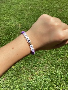 It's a quality handmade Olivia Rodrigo bracelet that you could wear to her GUTS tour! Personalized Purple Beaded Bracelet, Casual Purple Bracelet For Everyday, Casual Everyday Purple Bracelets, Casual Handmade Lavender Jewelry, Purple 8mm Bead Friendship Bracelets, Purple 8mm Beads Friendship Bracelet, Purple Stretch Bracelet With 8mm Beads For Friendship, Handmade Casual Purple Bracelets, Casual Purple Handmade Bracelets