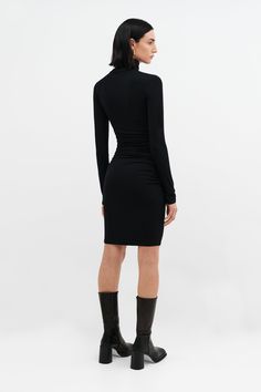 Who doesn't need a versatile turtleneck dress? Meet Phoebe. She sets the tone for any occasion. Her soft, high-stretch and sustainable European jersey gracefully hugs your figure while her mid-waist ruching detail provides a stylish slimming effect. Wear Phoebe for work, weekend, whatever — just switch out your shoes and accessories to match the mood.[SPLIT] Emily, in black, is 5'9.5" (177 cm) tall, wearing size XS. Maritza, in black, is 5'9.5" (177 cm) tall, wearing size XS. Astrid, in slate gr Oversized Tunic Dress, Black Turtleneck Dress, Turtleneck Dress, Grey Turtleneck, Black Turtleneck, Turtle Neck Dress, Grey Women, Winter Looks, Shoes And Accessories