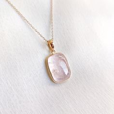 This stunning Pendant is set in 14k Solid Yellow Gold with Natural Morganite with utmost precision. It is a unique gemstone Pendant for nearly every occasion and is completely hassle-free jewelry. ITEM DETAILS: * Gem: Morganite * Gem Size: 15X15mm * Gem Shape: Square * Gem Weight: 9.20 carats * Gold Purity: 14KT * Gold Weight: 0.60 gram * Total Weight of the Pendant: 2.44 gram The Gold purity is guaranteed and it comes with authentic 14KT gold hallmark. Since my items are handmade, they are absolutely nickel and lead free. CUSTOMIZATION: * Gemstone customization is available and it can be substituted with a gem of your choice. Kindly message me for the same. PACKAGING * The Pendant comes with layers of safe and secure wrapping along with Free handmade jewelry box with every purchase. ➡️Hea 14k Gold Jewelry With Gemstone Accents For May Birthstone, Luxury Morganite Gemstone Jewelry, Dainty 14k Gold Jewelry With Natural Stones, Luxury Morganite Cushion Cut Jewelry, Luxury Cushion Cut Morganite Jewelry, Morganite Fine Jewelry In Yellow Gold, Formal Yellow Gold Morganite Jewelry, Formal Cushion Cut Morganite Jewelry, Exquisite Gold Gemstones With Accents