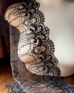 Beautiful quality European style lace ....  embroidered BLACK flowers on a fine COPPER colored nylon mesh backing, soft and lovely. There is NO STRETCH to this, other than the usual cross stretch nets typically have. Perfect for bras! * Listing is for one yard.   *Width is  about 9" LIMITED EDITION More lace, stretch lace, appliques, flowers, leaves and other lovelies located here: LACES: http://www.etsy.com/shop/MaryNotMartha?section_id=6414105 STRETCH LACES: http://www.etsy.com/shop/MaryNotMar Fitted Black Sheer Lace, Black Sheer Lace For Evening, Sheer Black Lace For Party, Black Sheer Lace For Party, Party Black Lace With Contrast Detail, Black Lace With Patchwork For Evening, Fitted Black Lace With Lace Trim, Black Scalloped Lace For Evening, Black Lace With Lace Trim For Party