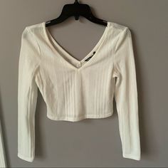 Excellent Condition, Bought But Never Wore After Taking Tags Off Super Cute Plunge Neck & Back Slightly Rubbed Material Off White Color 30% Viscose, 65% Polyester, 5% Spandex Chic White V-neck Crop Top, White Crop Top For Night Out, White V-neck Crop Top For Spring, White V-neck Crop Top For Night Out, White Fitted V-neck Crop Top, White V-neck Top For Night Out, Shein Tops, Off White Color, Long Sleeve Crop