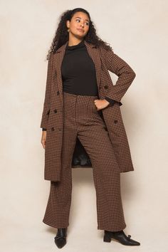 Get ready to strut your stuff in our Tabitha Trousers! Made from a chic houndstooth woven fabric in brown, black, and rust, these ankle length slacks are the perfect addition to any fall wardrobe. With convenient pockets, a secure hook and bar closure, and full lining, these non-stretch slacks offer both style and functionality. Time to step up your fashion game! Brown Bottoms For Business Casual In Fall, Brown Office Pants For Fall, Winter Office Brown Bottoms, Winter Houndstooth Bottoms For Workwear, Houndstooth Pattern Bottoms For Winter Workwear, Winter Herringbone Pattern Pants For Work, Brown Bottoms For Fall Workwear, Brown Pants For Workwear In Fall, Office Wear Pants With Pockets For Fall