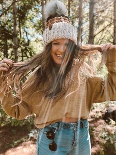 This waffle texture, yep, we're in love! Make a statement with this foldover chunky beanie, designed for all of your cold-weather adventures this fall and winter. hand crocheted waffle stitch pom beanie color: Linen, Tan, Black handmade faux fur pom-pom laser engraved vegan faux leather tag in whiskey 100% premium acrylic. heavy weight, perfect for cold temps spot clean affected areas/hand wash cold, lay flat to dry Trendy Slouchy Crochet Hat For Fall, Chunky Knit Beanie For Fall, Slouchy Brown Beanie For Fall, Warm Crochet Hat For Outdoor Fall Activities, Warm Crochet Hat For Outdoor Fall Use, Warm Crochet Hat For Cold Weather In Fall, Trendy Crochet Hat For Cold Fall Weather, Warm Crochet Hat For Fall And Cold Weather, Trendy Crochet Hat For Cold Weather