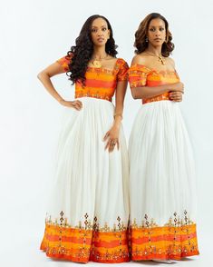 Description Indulge in the mesmerizing allure of Ethiopian tradition with our exquisite Habesha Kemis in a breathtaking shade of vibrant orange. Crafted with meticulous attention to detail, this resplendent garment embodies the rich cultural heritage of Ethiopia, capturing the essence of elegance and sophistication. Each stitch tells a story of tradition and craftsmanship, making it a timeless piece that exudes grace and charm. The vibrant orange hue adds a contemporary twist to the classic Habesha dress, infusing it with a burst of energy and vitality. Whether you're attending a special occasion or celebrating cultural festivities, this stunning ensemble is sure to turn heads and leave a lasting impression. Material Cotton Menen Thread Estimated delivery : 3 weeks to 5 weeks Delivered to Holiday Wedding Dress, Ethiopian Coffee, Ethiopian Dress, Habesha Kemis, Vibrant Orange, Cultural Heritage, Wedding Dresses Simple, Ethiopia, Traditional Dresses