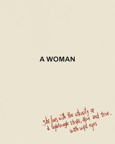 a woman with the words she has written in red ink on white paper, and there is