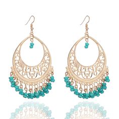 PRICES MAY VARY. Unique Design: The tassel earrings are nested in a filiform crescent shaped design with complex beading details. They adopt a click closure design, which is fashionable and exquisite, and will never go out of style Excellent Material: Bohemian earrings are made of high-quality alloy, non-toxic, nickel free, low allergenic, and not easily fade, suitable for wearing Mexican filigree earrings: The filigree design involves weaving small metal threads into exquisite shapes. These ear Bohemian Chandelier, Fashion Beads, Beaded Tassel Earrings, Indian Earrings, Filigree Earrings, Beaded Hoops, Beaded Dangle Earrings, Fashion Jewelry Earrings, Beaded Tassels