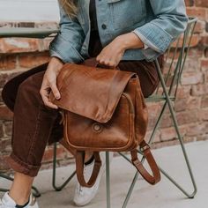 Our leather bags for women bring handmade fashion to practical function — like this beautiful women’s brown leather backpack! The simple style means these backpacks are the perfect casual addition to any outfit. Just right for women who appreciate quality and style. #fashiongoals Leather Flap Backpack For On-the-go, Vintage Leather Everyday Backpack, Vintage Leather Satchel Backpack With Waxed Finish, Vintage Leather Backpack With Waxed Finish For Everyday Use, Vintage Waxed Leather Satchel Backpack, Vintage Leather Backpack With Leather Lining, Vintage Waxed Leather Backpack For Everyday Use, Vintage Leather Backpack With Waxed Finish, Vintage Backpack With Leather Lining For Everyday Use