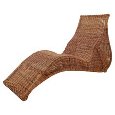 a wicker chaise lounge chair on an isolated white background